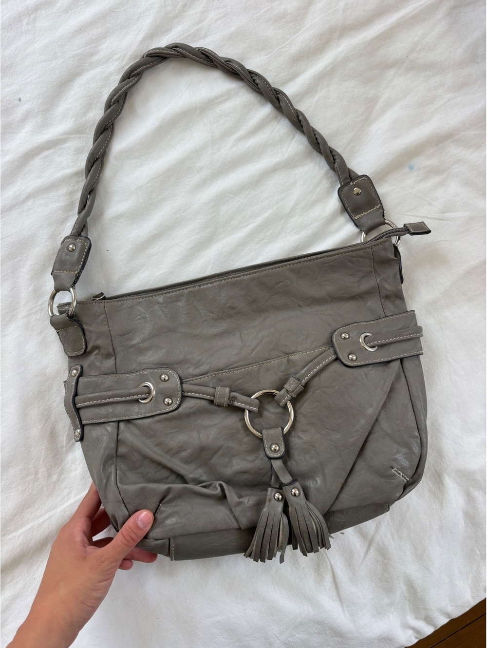 Gray faux leather shoulder bag with tassel